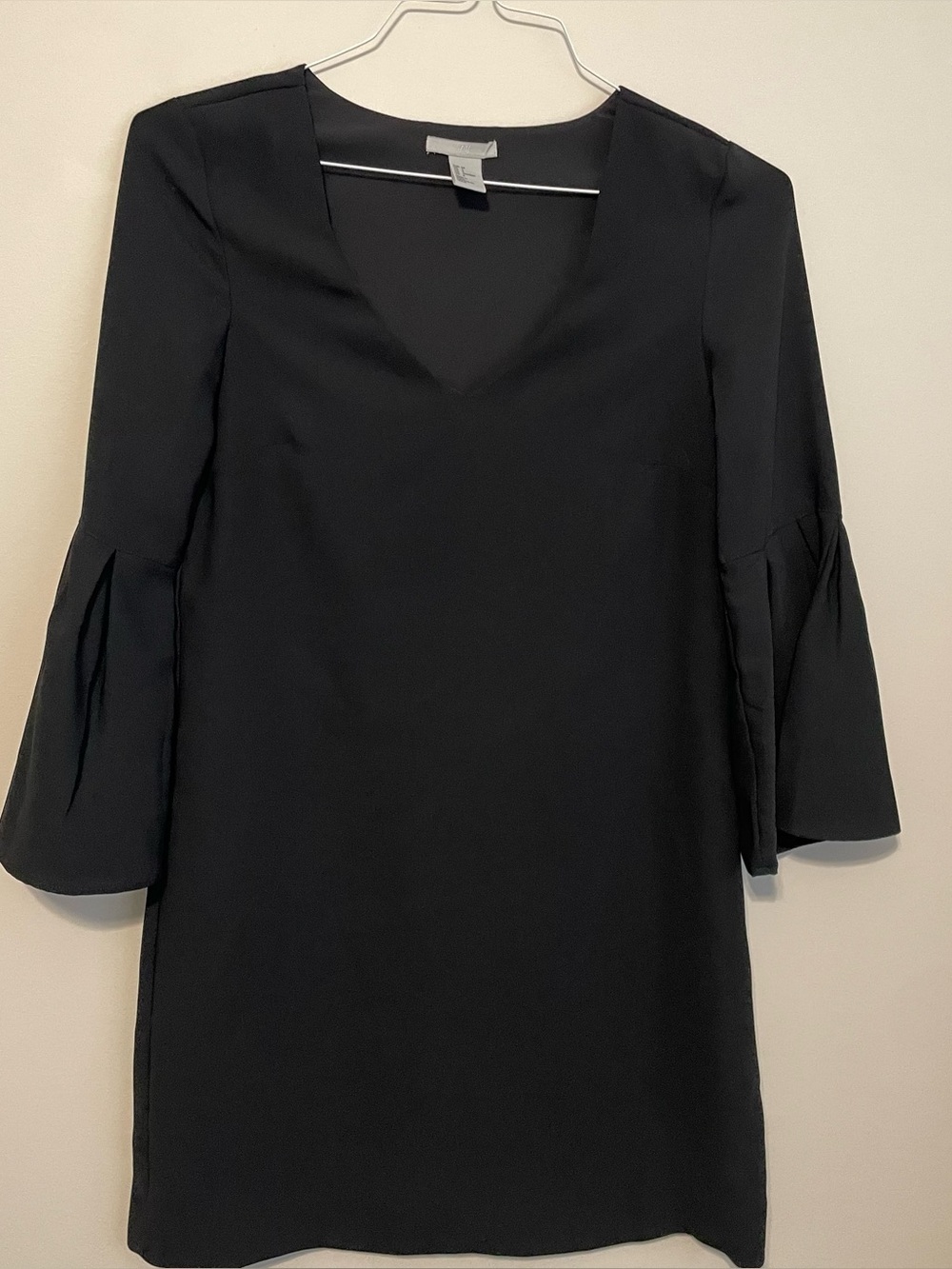 Black H&M mini dress with bell sleeves